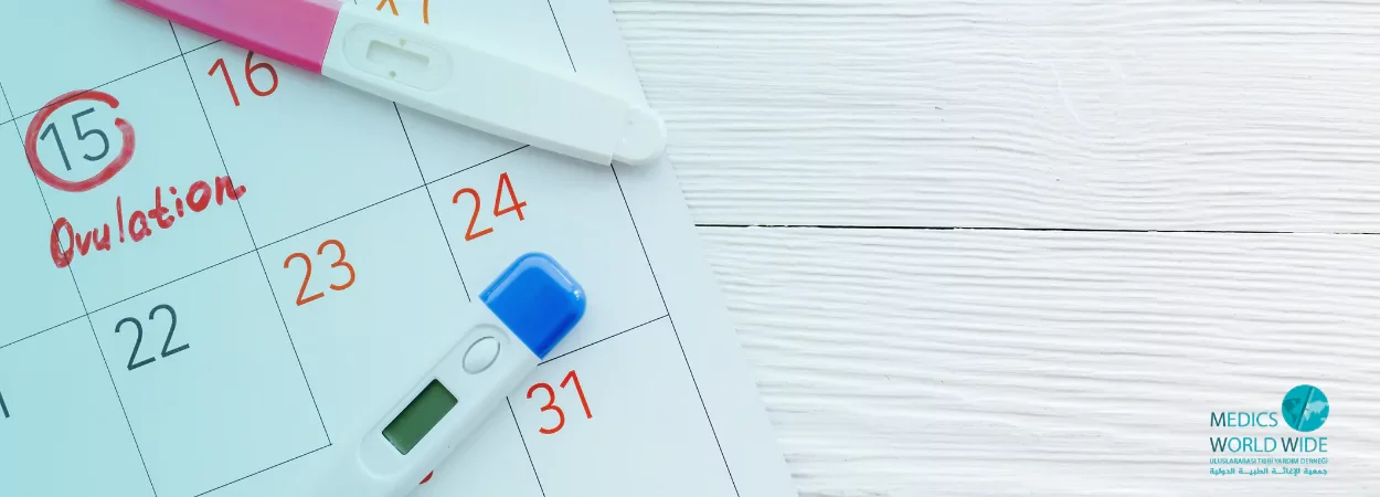 pregnancy test and calendar to follow and calculate ovulation days. Logo Medics is down the right.